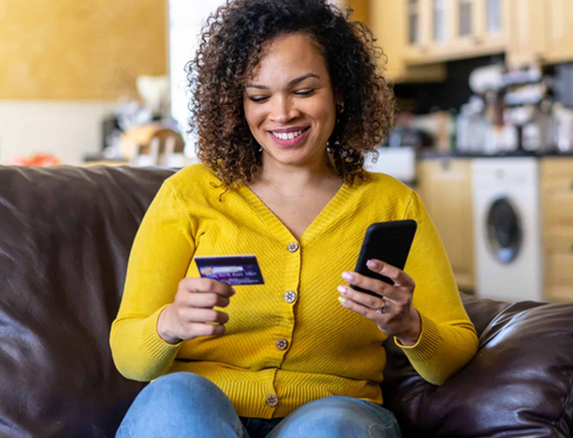 a person holding a cell phone a person holding a cell phone